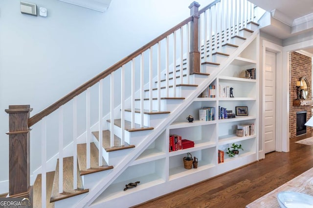 1753 Russell St SE, Atlanta, GA 30316 - stairs featuring wood finished floors and crown molding