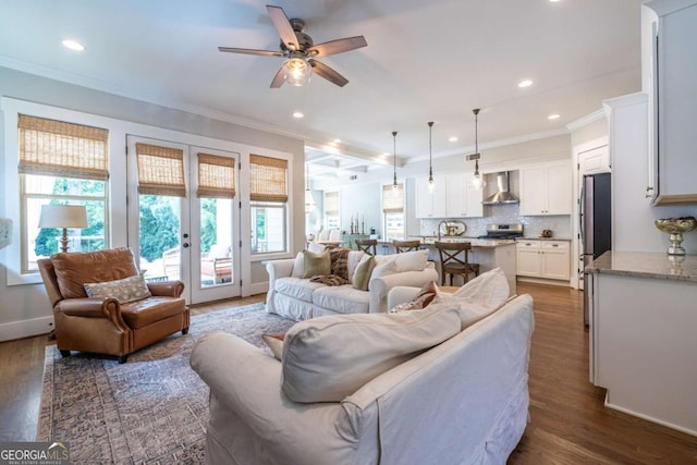 1753 Russell St SE, Atlanta, GA 30316 - living area with ornamental molding, dark wood-style floors, ceiling fan, recessed lighting, and french doors