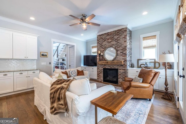 1753 Russell St SE, Atlanta, GA 30316 - living area with a ceiling fan, dark wood-style floors, recessed lighting, ornamental molding, and a fireplace