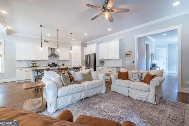 1753 Russell St SE, Atlanta, GA 30316 - living room with wood finished floors, ceiling fan, recessed lighting, baseboards, and ornamental molding