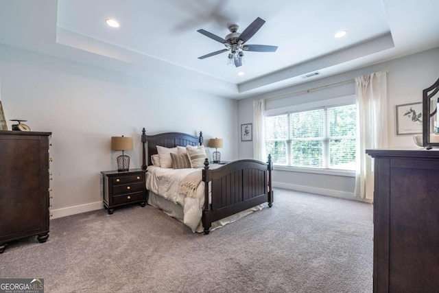 1753 Russell St SE, Atlanta, GA 30316 - carpeted bedroom featuring a tray ceiling, baseboards, recessed lighting, and ceiling fan