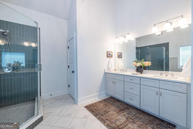 1753 Russell St SE, Atlanta, GA 30316 - full bath featuring double vanity, marble look tile flooring, a stall shower, and baseboards