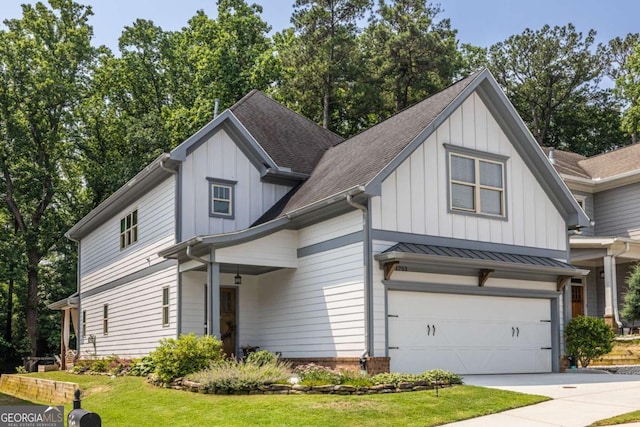 1753 Russell St SE, Atlanta, GA 30316 - modern farmhouse with board and batten siding, roof with shingles, driveway, an attached garage, and a front lawn