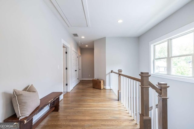 1753 Russell St SE, Atlanta, GA 30316 - hallway with attic access, light wood-type flooring, recessed lighting, an upstairs landing, and baseboards