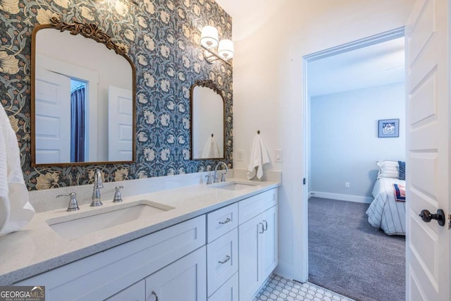 1753 Russell St SE, Atlanta, GA 30316 - ensuite bathroom with wallpapered walls, double vanity, and baseboards