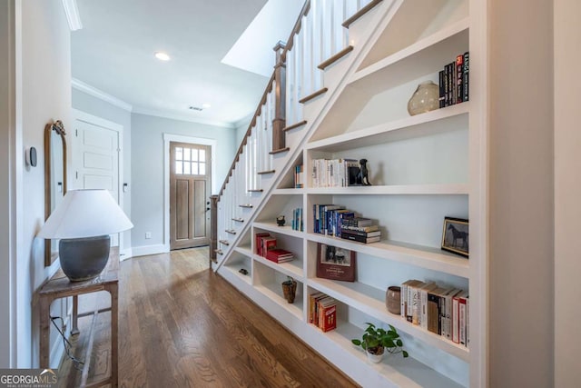 1753 Russell St SE, Atlanta, GA 30316 - foyer entrance featuring ornamental molding, dark wood-style flooring, stairs, recessed lighting, and baseboards