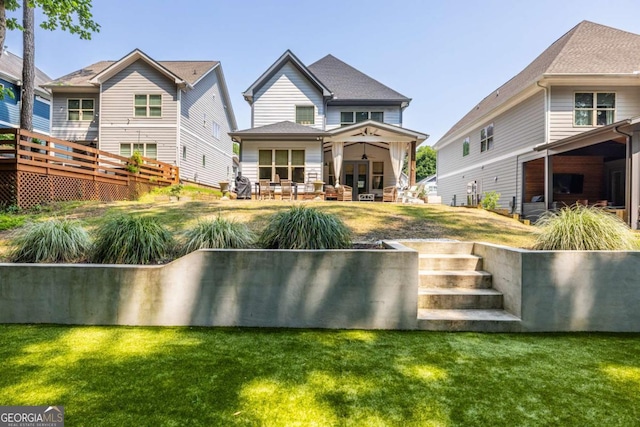 1753 Russell St SE, Atlanta, GA 30316 - rear view of house featuring a lawn and a ceiling fan