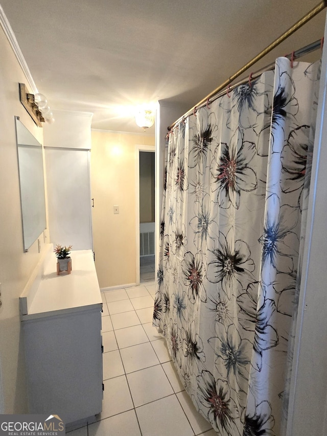 35 Cheatham St, Wadley, GA 30477 - full bathroom with vanity, tile patterned floors, a shower with shower curtain, and baseboards