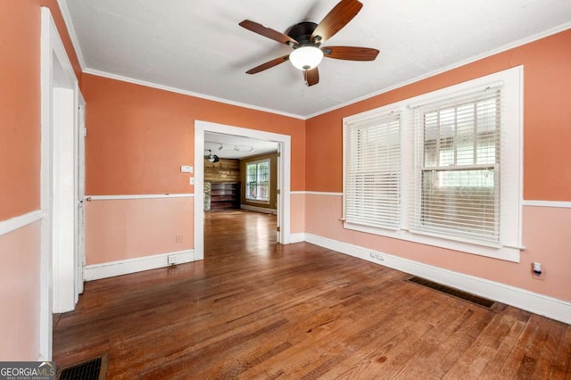 3956 Tell Rd SW, Atlanta, GA 30331 - spare room featuring a ceiling fan, wood finished floors, and ornamental molding