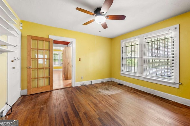 3956 Tell Rd SW, Atlanta, GA 30331 - unfurnished room featuring wood-type flooring and ceiling fan