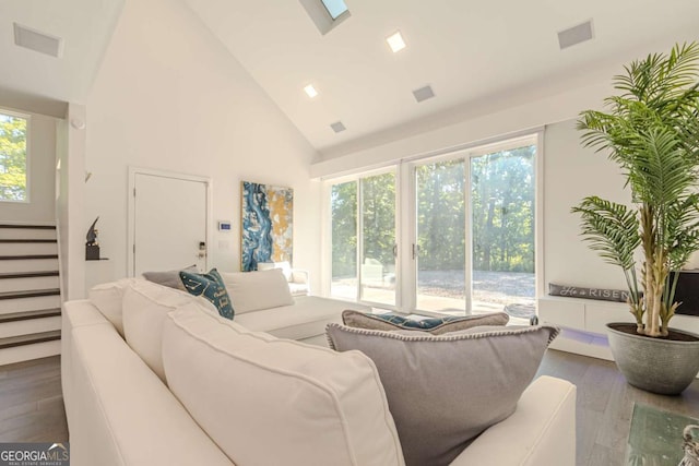 85 Lila Way, Dahlonega, GA 30533 - living room featuring hardwood / wood-style floors, healthy amount of natural light, stairway, and high vaulted ceiling