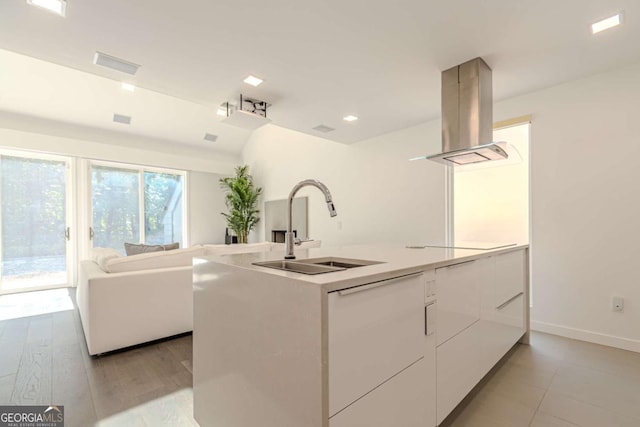 85 Lila Way, Dahlonega, GA 30533 - kitchen with a sink, island range hood, white cabinets, modern cabinets, and open floor plan