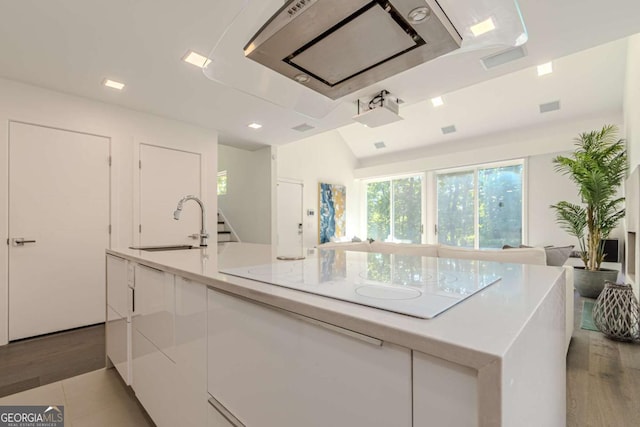 85 Lila Way, Dahlonega, GA 30533 - kitchen featuring white cabinetry, a sink, white electric stovetop, and light wood-style floors