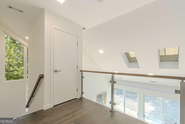 85 Lila Way, Dahlonega, GA 30533 - hall featuring a skylight, wood finished floors, and an upstairs landing