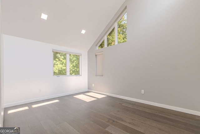 85 Lila Way, Dahlonega, GA 30533 - empty room with baseboards, wood finished floors, high vaulted ceiling, and healthy amount of natural light