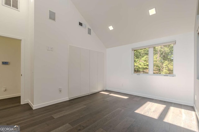 85 Lila Way, Dahlonega, GA 30533 - empty room featuring dark wood-style flooring, high vaulted ceiling, and baseboards