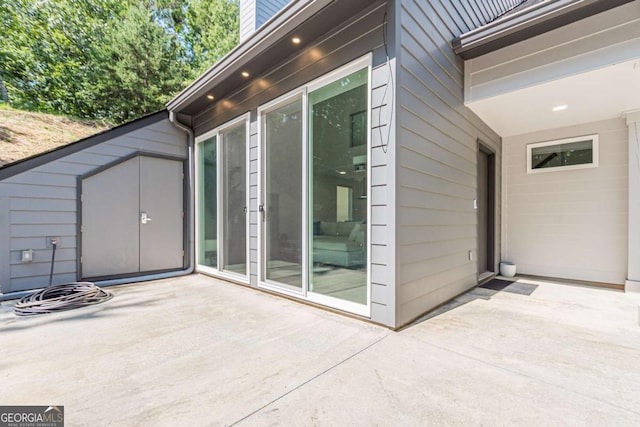 85 Lila Way, Dahlonega, GA 30533 - doorway to property featuring a patio and a chimney