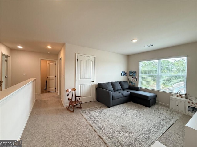 5996 Screech Owl Dr, Flowery Branch, GA 30542 - living area with light carpet, recessed lighting, and baseboards