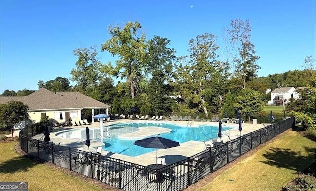 5996 Screech Owl Dr, Flowery Branch, GA 30542 - community pool with a patio area