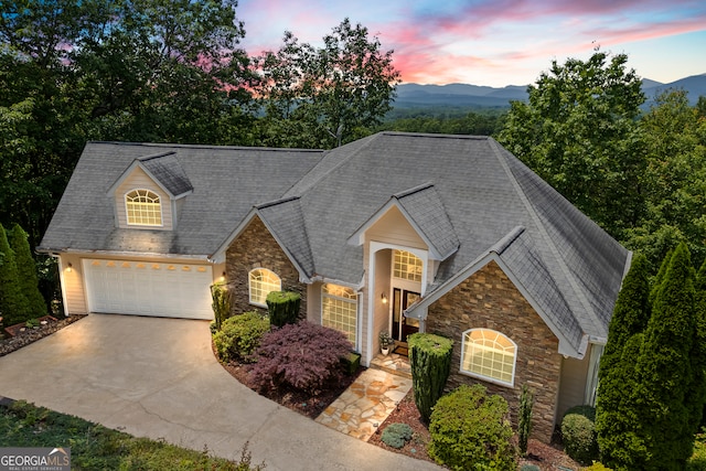 894 Oak Pointe Dr, Cleveland, GA 30528 - traditional-style home featuring stone siding, driveway, and a mountain view