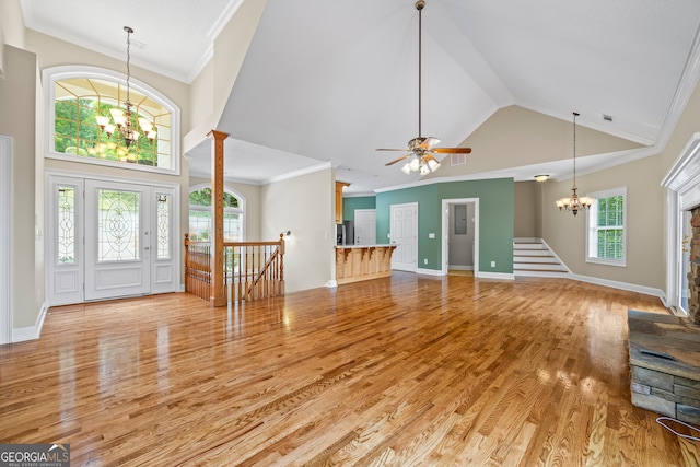 894 Oak Pointe Dr, Cleveland, GA 30528 - entrance foyer featuring a chandelier, plenty of natural light, light wood-style flooring, ornamental molding, and ceiling fan
