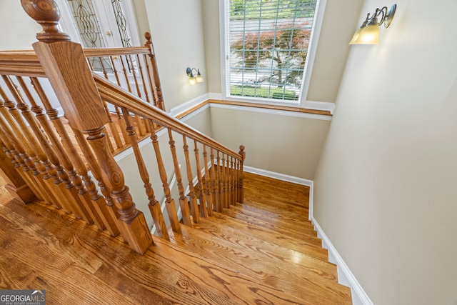 894 Oak Pointe Dr, Cleveland, GA 30528 - stairway featuring wood finished floors and baseboards