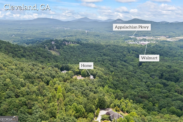 894 Oak Pointe Dr, Cleveland, GA 30528 - drone / aerial view of a heavily wooded area and a mountainous background