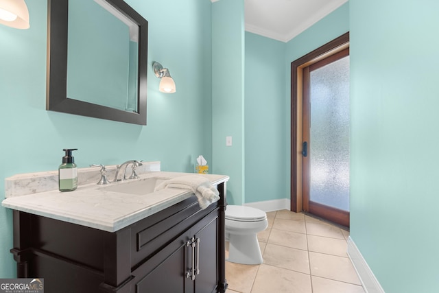 353 Indigo Hills Rd, Pembroke, GA 31321 - half bath featuring toilet, vanity, crown molding, tile patterned flooring, and baseboards
