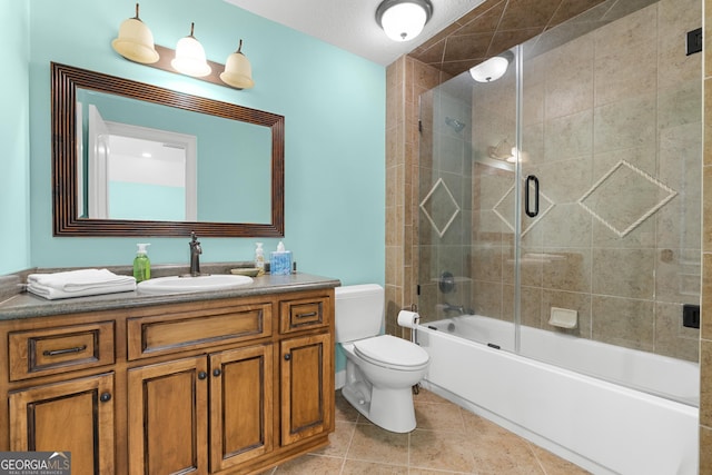 353 Indigo Hills Rd, Pembroke, GA 31321 - bathroom with vanity, toilet, shower / bath combination with glass door, and tile patterned flooring