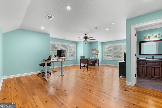 353 Indigo Hills Rd, Pembroke, GA 31321 - office with light wood finished floors, ceiling fan, a sink, recessed lighting, and baseboards