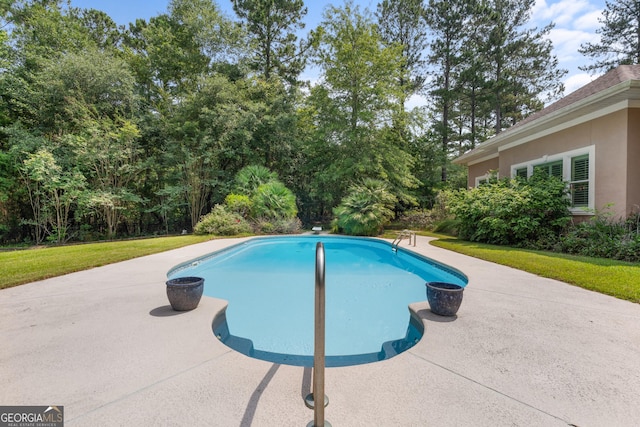 353 Indigo Hills Rd, Pembroke, GA 31321 - outdoor pool with a patio and a yard