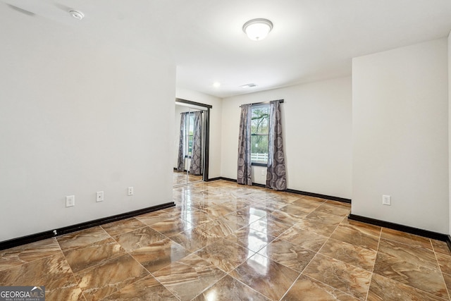 2711 Mcdonough Rd, Hampton, GA 30228 - empty room with marble tiled flooring, baseboards, and a smoke detector