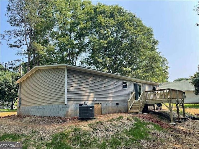 921 Marshall Fuller Rd, Dallas, GA 30157 - back of house featuring a deck, stairway, and crawl space