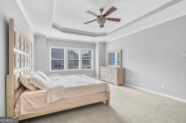 2029 Havenhurst Way, Auburn, GA 30011 - bedroom featuring crown molding, a raised ceiling, baseboards, carpet floors, and ceiling fan
