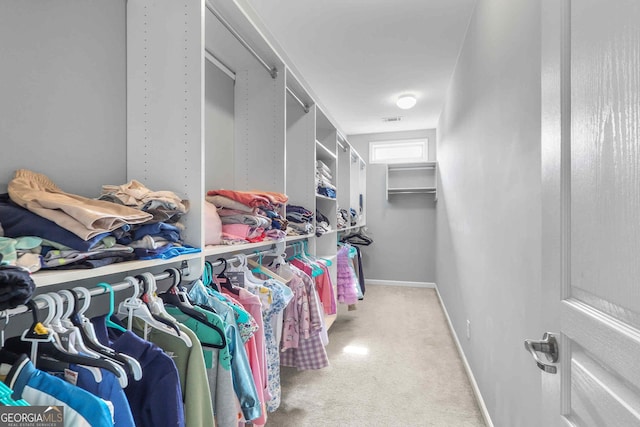 2029 Havenhurst Way, Auburn, GA 30011 - walk in closet featuring carpet flooring