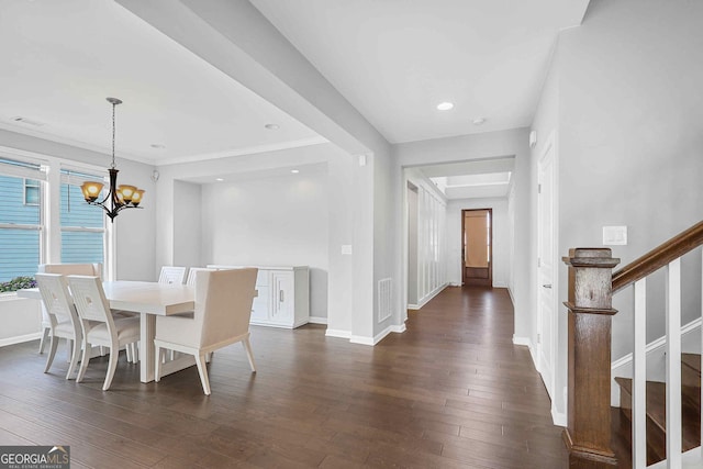 2029 Havenhurst Way, Auburn, GA 30011 - dining area featuring a chandelier, dark wood-style floors, stairs, baseboards, and recessed lighting