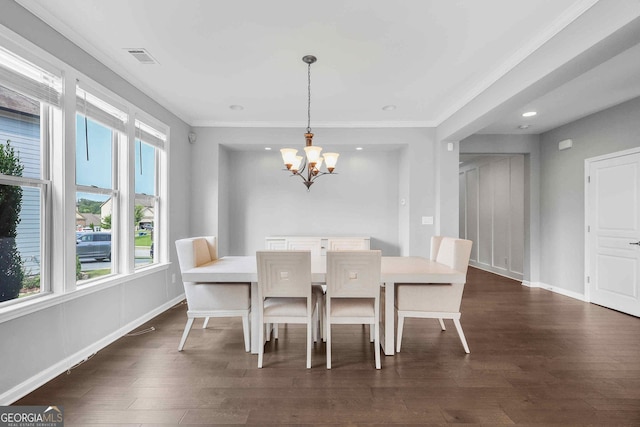 2029 Havenhurst Way, Auburn, GA 30011 - dining room with a chandelier, healthy amount of natural light, ornamental molding, dark wood finished floors, and baseboards