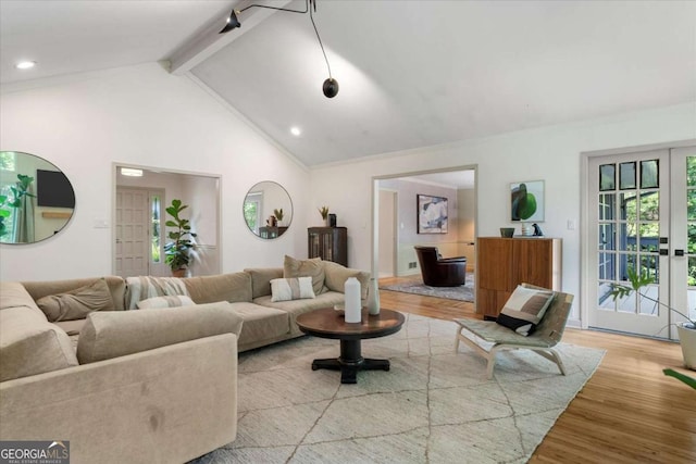 11785 Mountain Laurel Dr, Roswell, GA 30075 - living room with beam ceiling, wood finished floors, and high vaulted ceiling