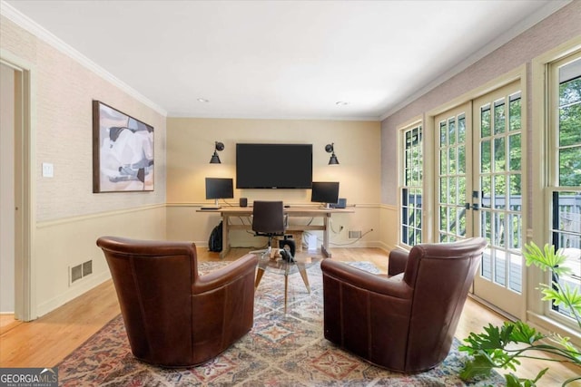 11785 Mountain Laurel Dr, Roswell, GA 30075 - living area with wood finished floors, ornamental molding, a desk, and wainscoting