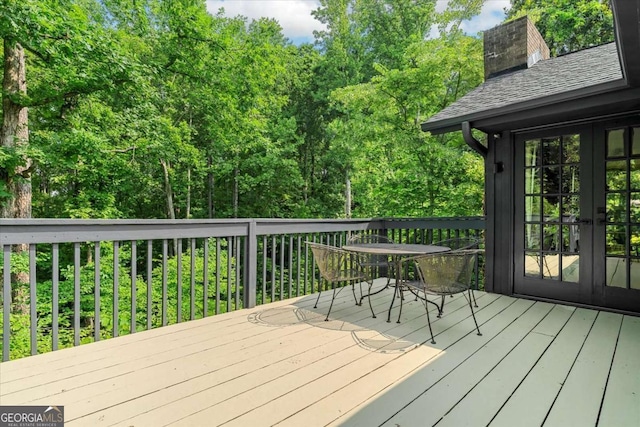 11785 Mountain Laurel Dr, Roswell, GA 30075 - wooden terrace featuring french doors and outdoor dining area