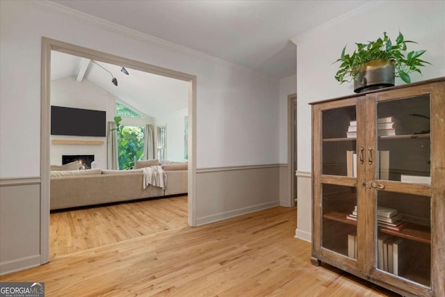 11785 Mountain Laurel Dr, Roswell, GA 30075 - corridor with wood finished floors and ornamental molding