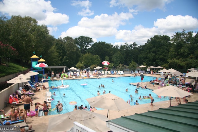 11785 Mountain Laurel Dr, Roswell, GA 30075 - community pool featuring a patio