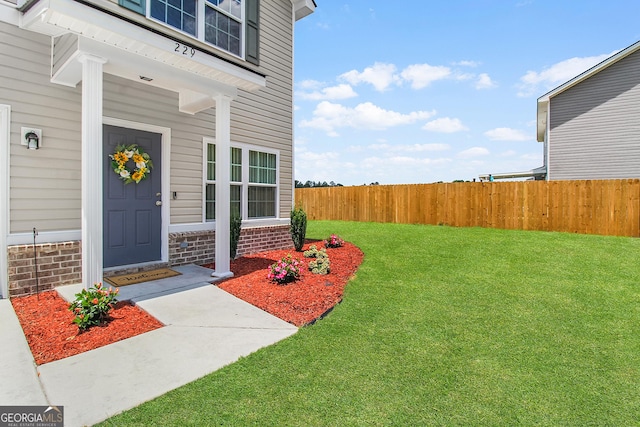 229 Wellspring Ter, Allenhurst, GA 31301 - doorway to property featuring brick siding