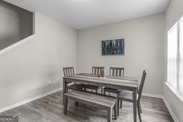 229 Wellspring Ter, Allenhurst, GA 31301 - dining space featuring wood finished floors and baseboards