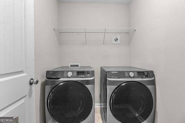 229 Wellspring Ter, Allenhurst, GA 31301 - laundry room featuring washing machine and clothes dryer