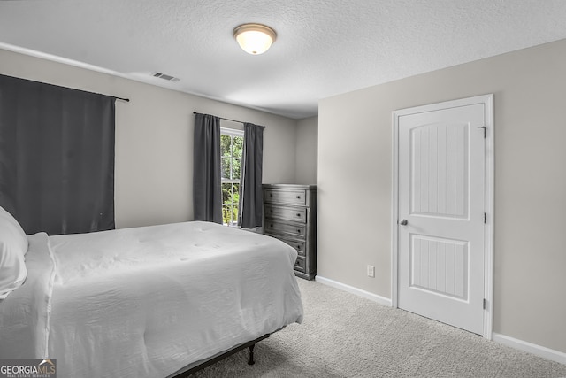 229 Wellspring Ter, Allenhurst, GA 31301 - bedroom with carpet, baseboards, and a textured ceiling