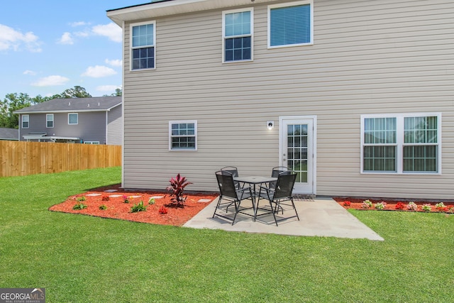 229 Wellspring Ter, Allenhurst, GA 31301 - back of house featuring a patio