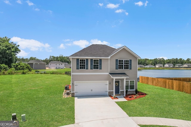 229 Wellspring Ter, Allenhurst, GA 31301 - traditional home featuring a garage, driveway, central AC unit, and a shingled roof