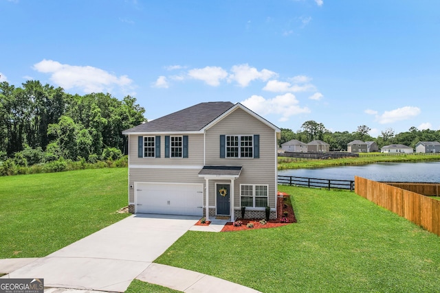229 Wellspring Ter, Allenhurst, GA 31301 - traditional home with a water view, a garage, driveway, and roof with shingles