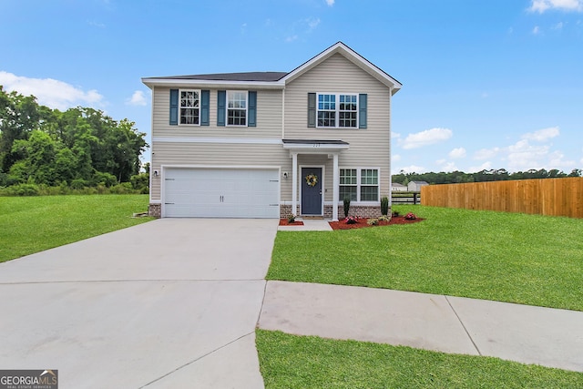 229 Wellspring Ter, Allenhurst, GA 31301 - view of front of house featuring driveway and an attached garage